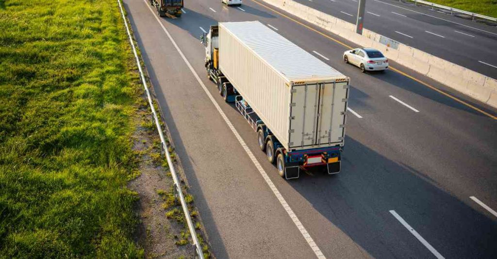 Container truck on a highway after a missed vessel booking